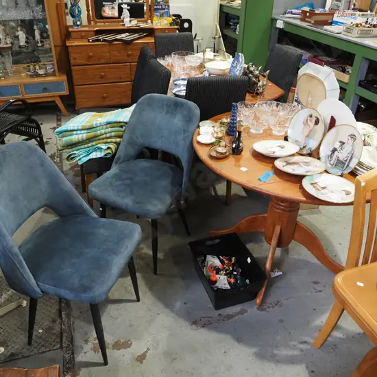 Indonesian hardwood drop side pedestal table with 2x unmatching blue upholstered chairs
