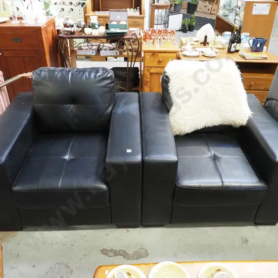 2x black vinyl upholstered armchairs - need a clean - light scratching