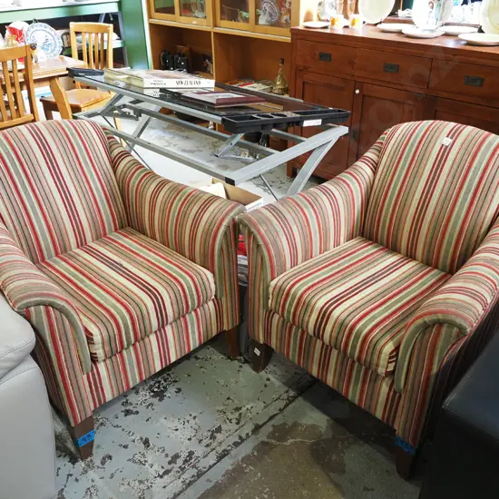 pair of striped upholstered armchairs