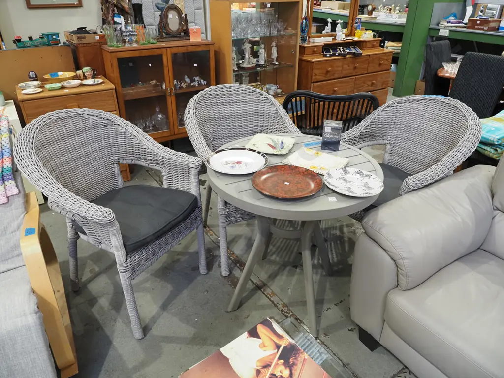 alloy pedestal outdoor table with 3 matching faux cane chairs with cushions Image 1++