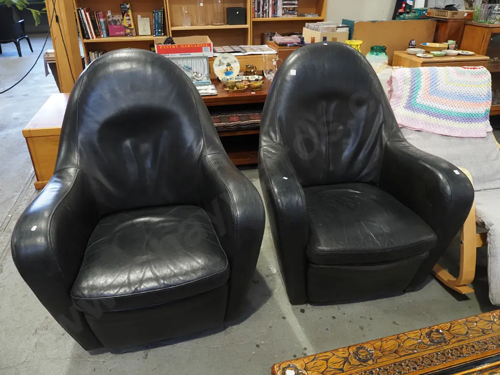 pair of retro black leather upholstered swivel rocking chairs Image 1++