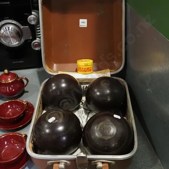 small suitcase, 4x lawn bowls