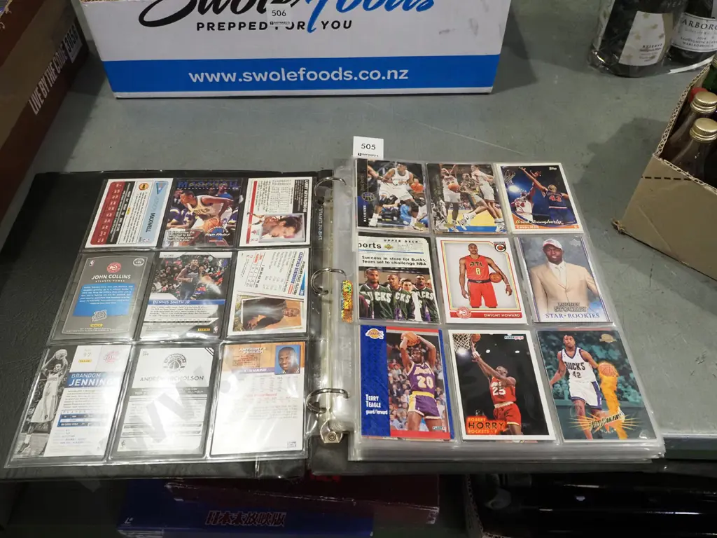 album of basketball collector cards Image 1++