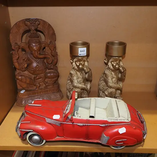 carved wooden Ganesha figurine, tea candle holders, model car