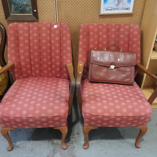 pair of mid century mahogany upholstered armchairs