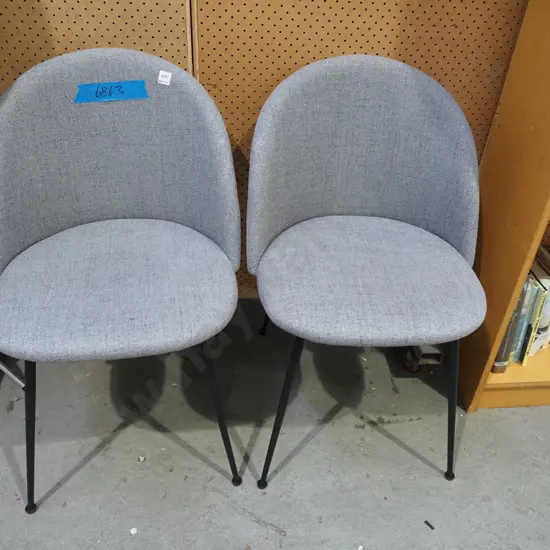 2x grey upholstered reception chairs