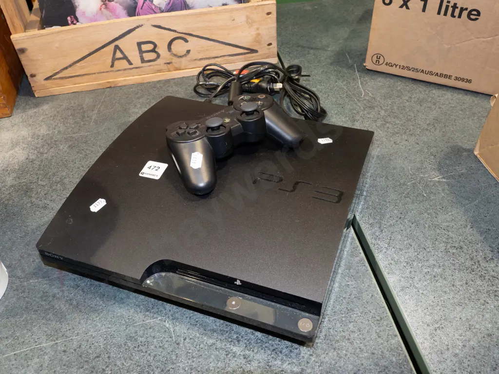 playstation 3  and controller Image 1++