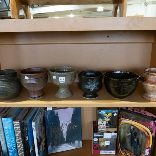 shelf of studio pottery vases, bowls, goblets Tallest H120