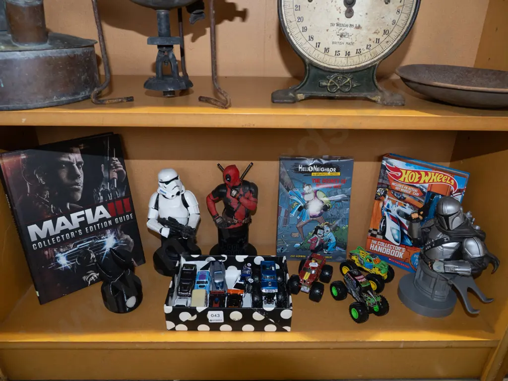 shelf; toy vehicles, figurines, graphic novel etc Image 1++