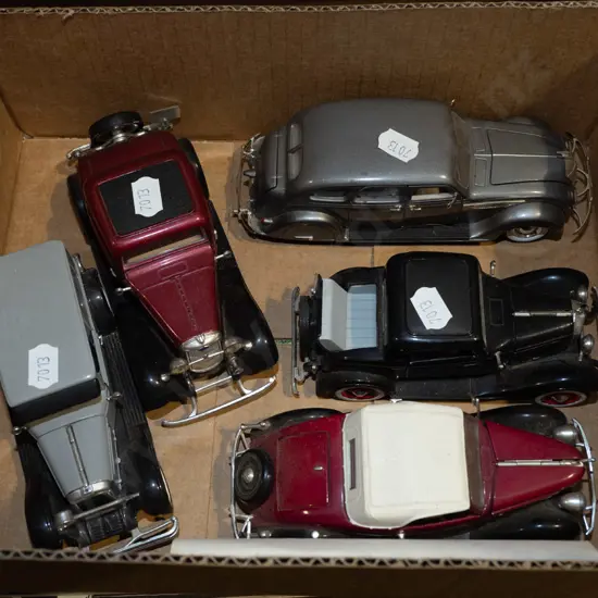 box of diecast vintage vehicles