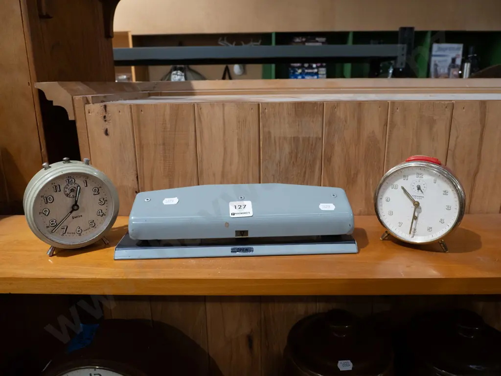 hole punch, 2x clockwork bedside clocks Image 1++