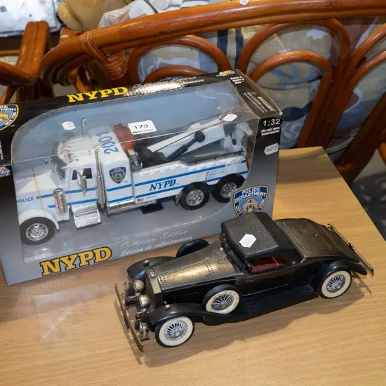 boxed diecast scale model NYPD tow truck, Rolls Royce transistor radio - as is no returns