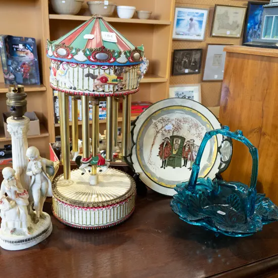 Royal Doulton plate, vintage battery powered carousel - as is, figural lamp base, blue glass basket