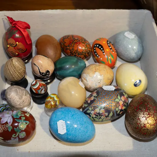 box of assorted stone eggs