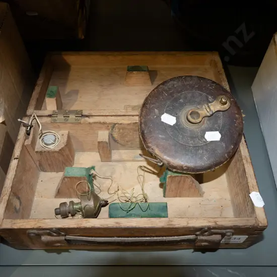 wooden equipment case, vintage builder's tape measure