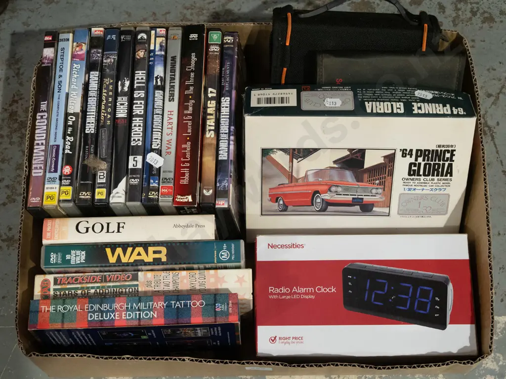 box; DVDs, radio alarm clock, model car Image 1++