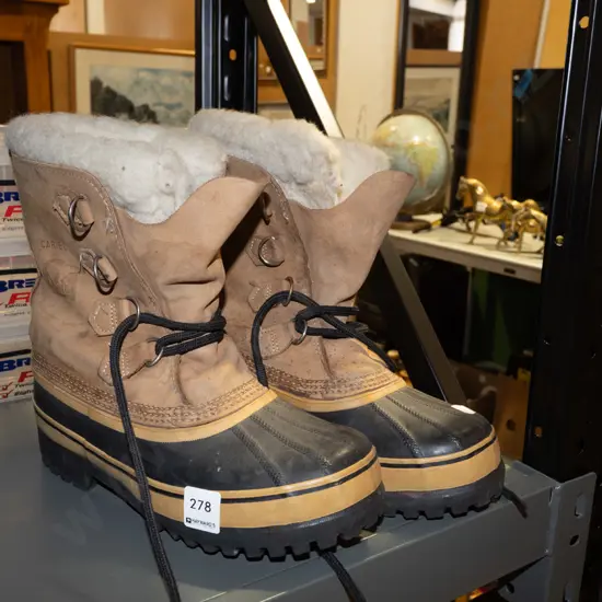 pair of Sorel size 8 snow boots
