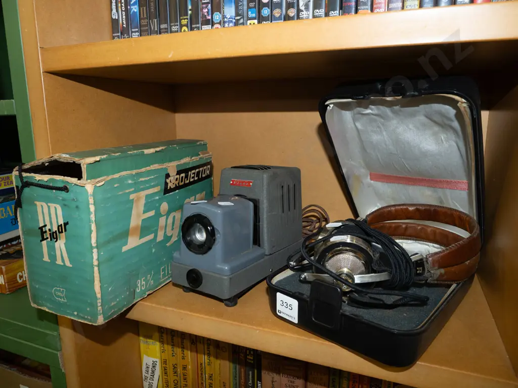 pair of vintage headphones, slide projector Image 1++
