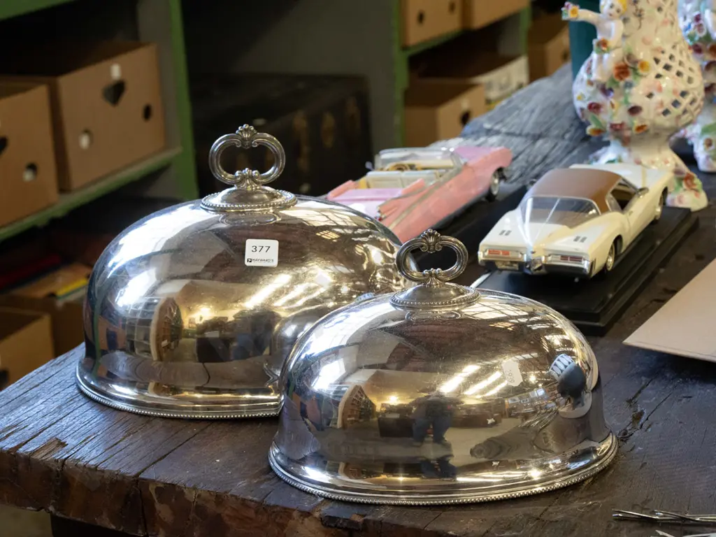 pair of plated food cover dishes Image 1++