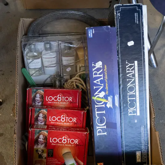 box; board games, toiletry set, loc8tor etc