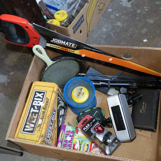 box; frying pan, rifle scope, travel games etc