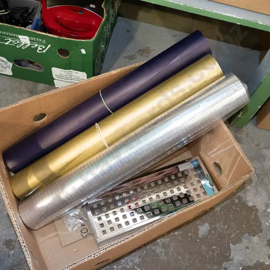 box; wrapping paper, chrome bathroom shelf etc