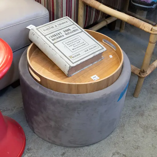 grey storage ottoman with reversible top that includes tray