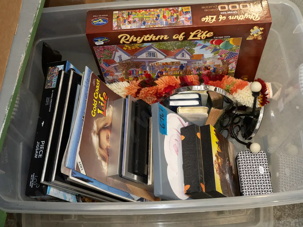 plastic storage tub; puzzles, prints, coat hooks etc Image 1++