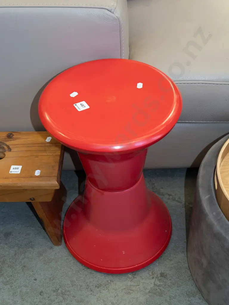red plastic Caroma shower stool Image 1++