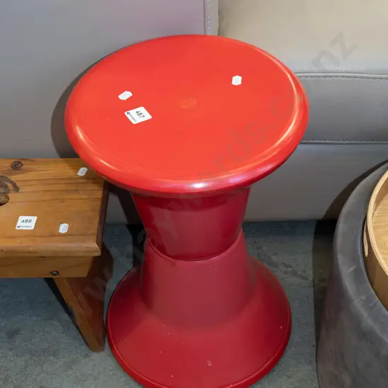 red plastic Caroma shower stool