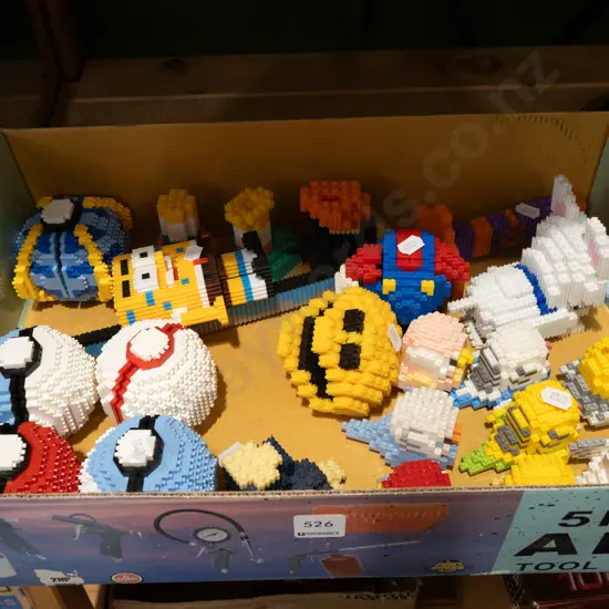 box of miniature Lego style figurines