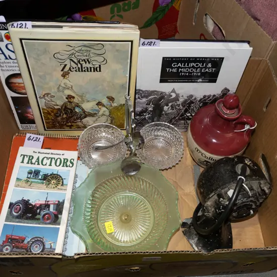 box; NZ history books, green glass bowls, whisky jug etc