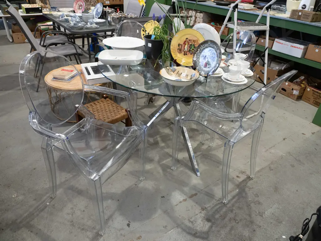 chrome based glass top circular dining table with 4x Kartell Ghost Louis style clear polycarbonate chairs H750 Diam1140 Image 1++
