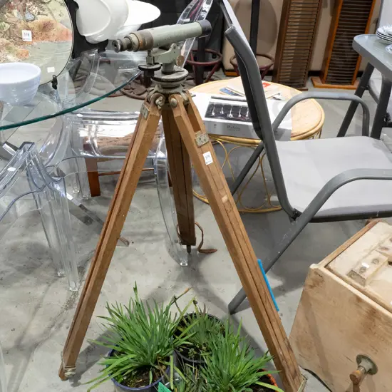 vintage theodolite on tripod base