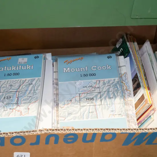 box of various New Zealand topographical maps