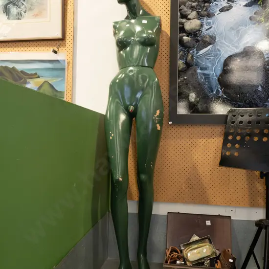 green painted female shop mannequin - no arms