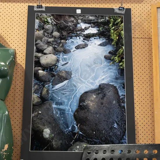 unframed photograph - frozen stream