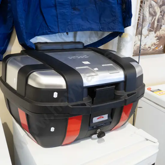 motorcycle top box featuring polymer body and aluminium outer lid finish - key in office