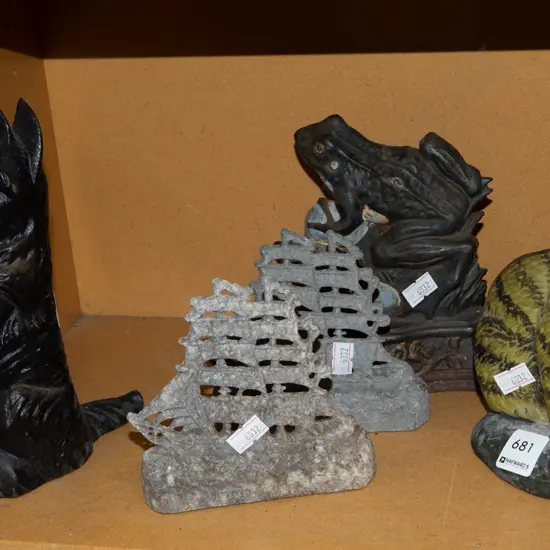 3x cast iron animal themed door stops, 2x cast alloy sailing ships