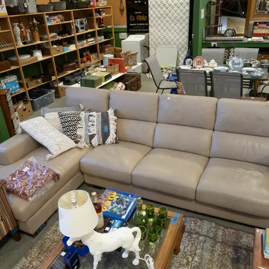 taupe leather uphostered 4 seater corner lounge suite with left hand turn W2900 D1800 