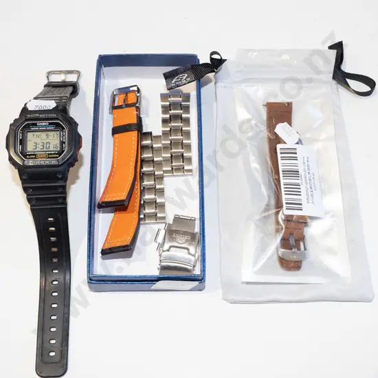 Casio G shock watch, container of various watch parts