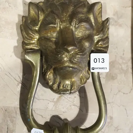 brass lion door knocker