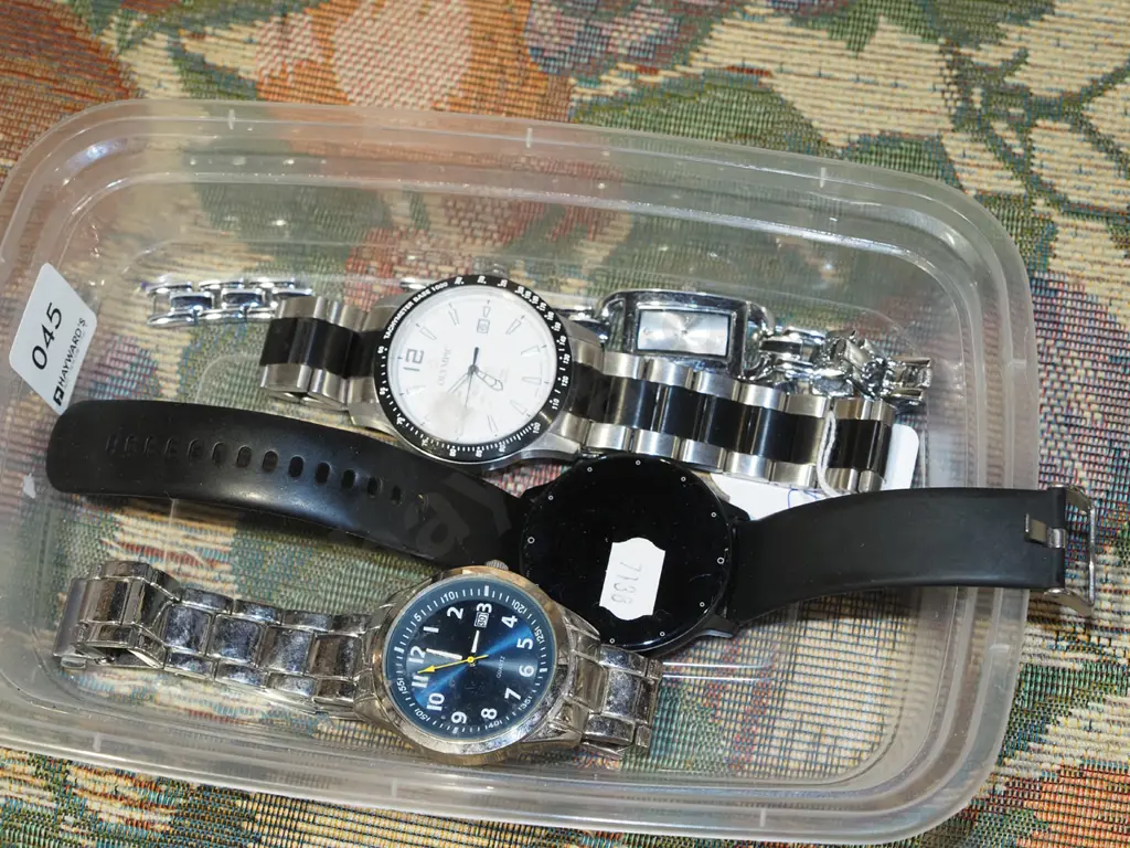 tray of wristwatches Image 1++