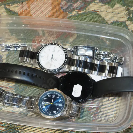 tray of wristwatches