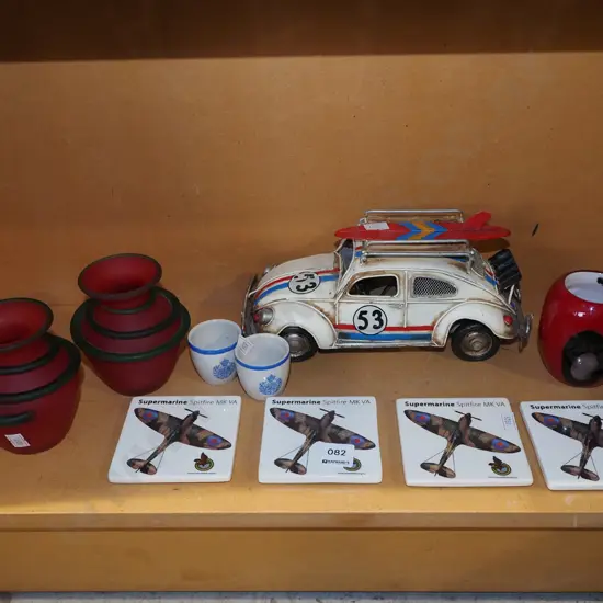 ceramic spitfire coasters, metal VW vehicles, glass vases etc