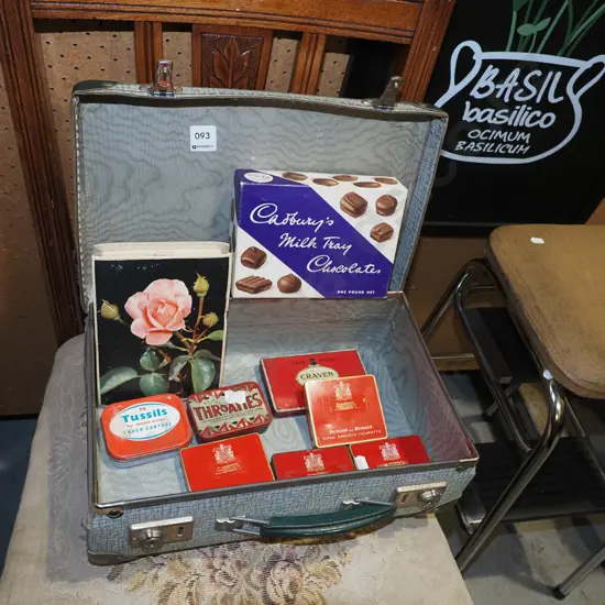 small vintage suitcase, tins, chocolate boxes