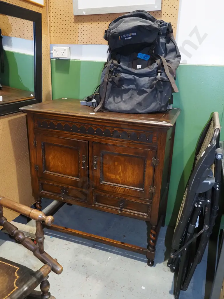 Edwardian oak 2 door, 2 drawer lift up gramophone cabinet with drop metal handles and carved details Image 1++