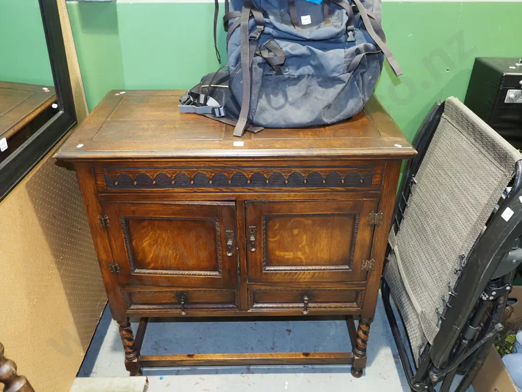 Edwardian oak 2 door, 2 drawer lift up gramophone cabinet with drop metal handles and carved details Image 1++