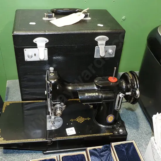 small Singer Featherweight 221 portable sewing machine 
