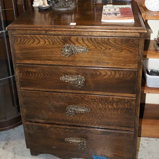 oak 4 drawer chest with off set handles H840 W610